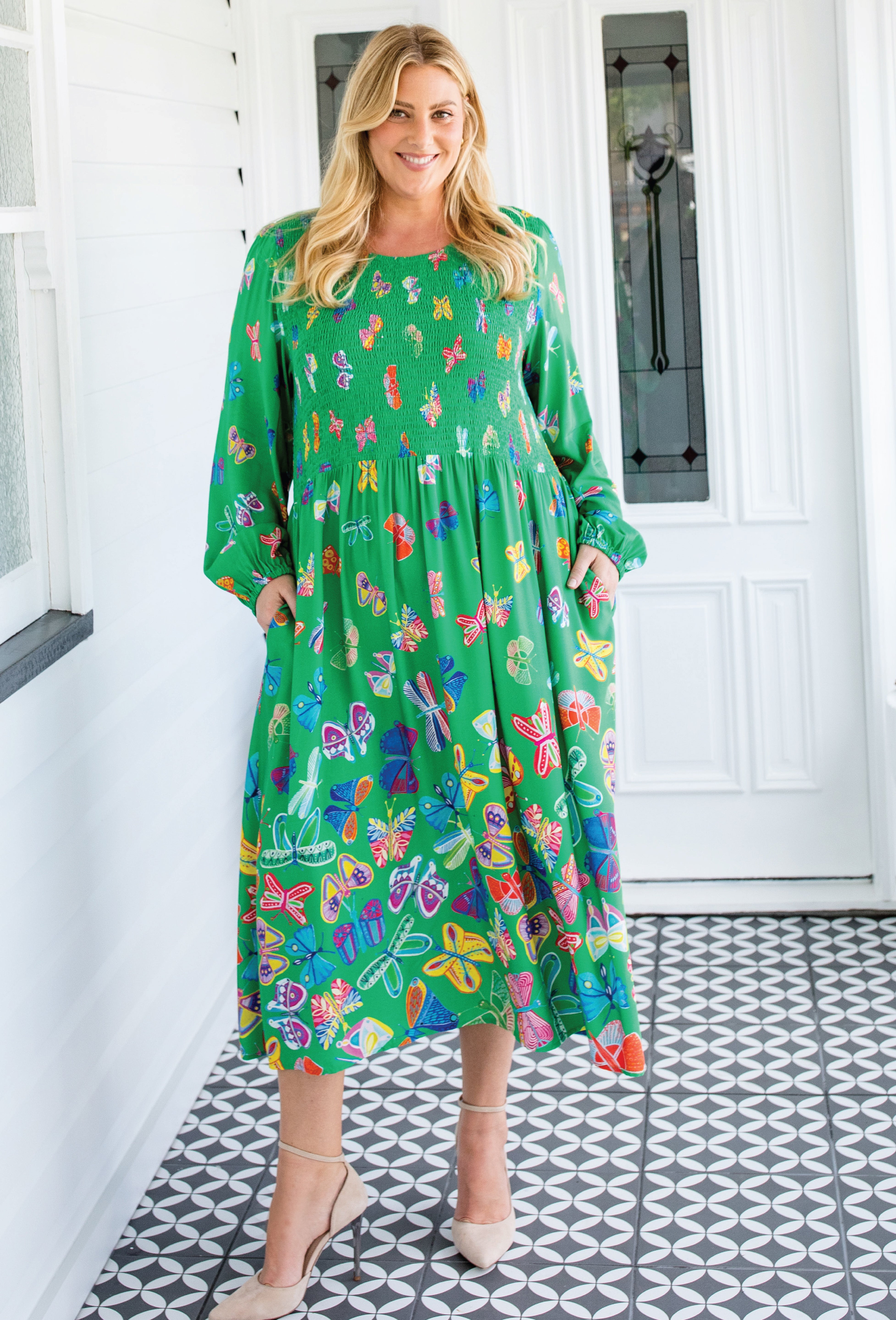 Green Butterfly print midi dress by Maiocchi, featuring artwork from local artist Lordy Dordie.