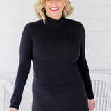 Versatile black bamboo skivvy by Maiocchi – your go-to base layer from work to weekend