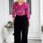 Back view of Bianca Pant in black velvet – elegant wide-leg silhouette