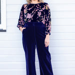Model wearing Bianca Pant in midnight velvet – high-rise waist and dramatic wide-leg silhouette