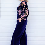 Side view of Bianca Pant in midnight velvet - smooth wide-leg drape for elegant fit