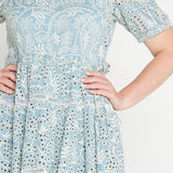 Round neckline and adjustable drawstring waist on Eloise Dress in blue lace