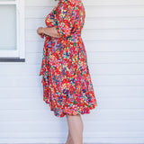 Emily Reversible Dress in name dropper red