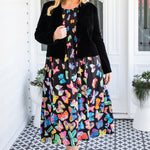 Model wearing Perfect Velvet Blazer in black – nipped waist and slim sleeves