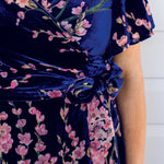 Close-up of blossom blue velvet fabric on the Violet Dress – soft luxurious velvet