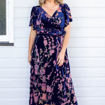 Model wearing Violet Dress in blossom blue velvet – flattering A-line silhouette