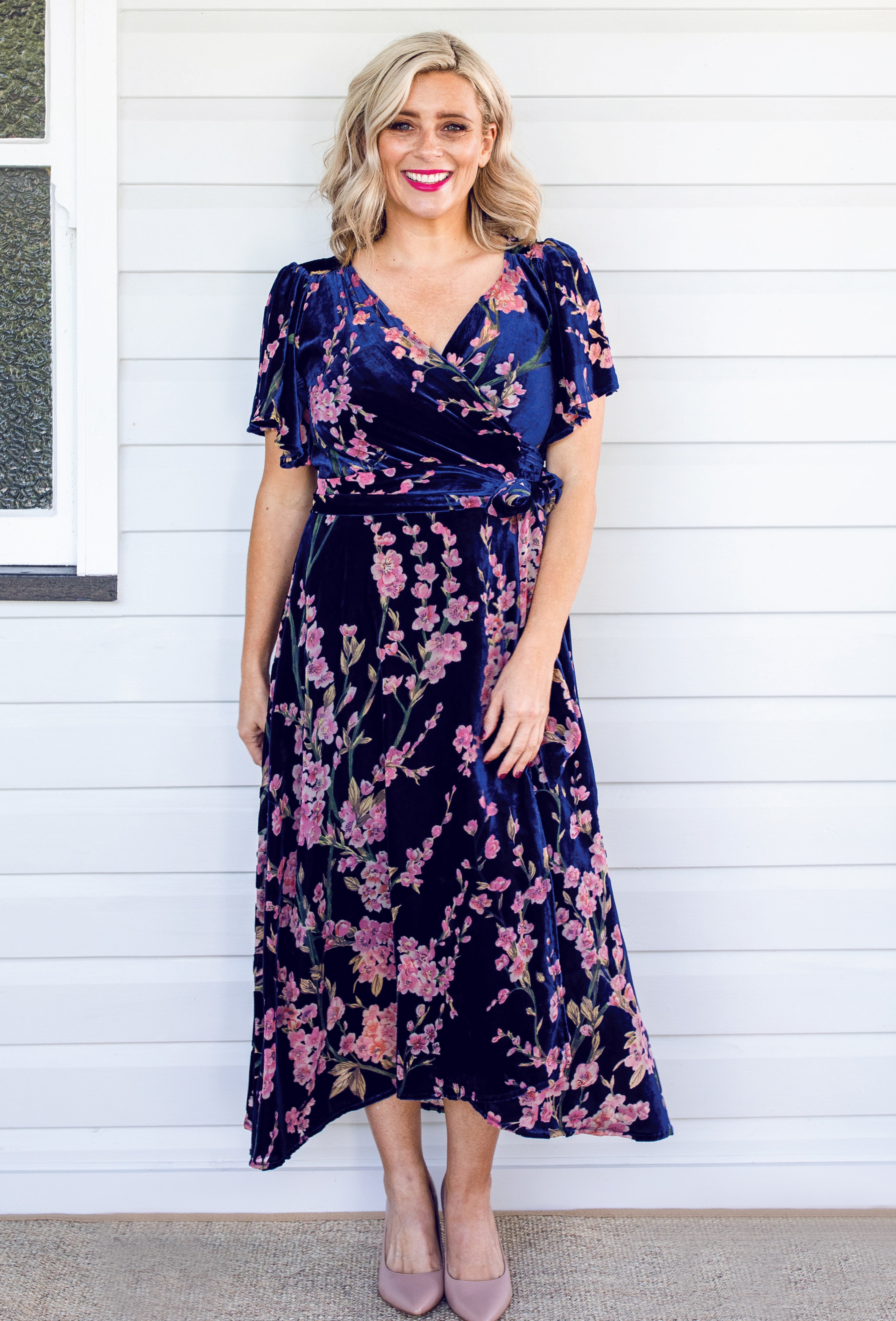 Model wearing Violet Dress in blossom blue velvet – flattering A-line silhouette