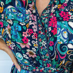 Close-up of Truly Madly custom print on Alison Shirt Dress – peacock & floral detail in navy