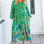 Green Butterfly print midi dress by Maiocchi, featuring artwork from local artist Lordy Dordie.