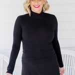 Versatile black bamboo skivvy by Maiocchi – your go-to base layer from work to weekend