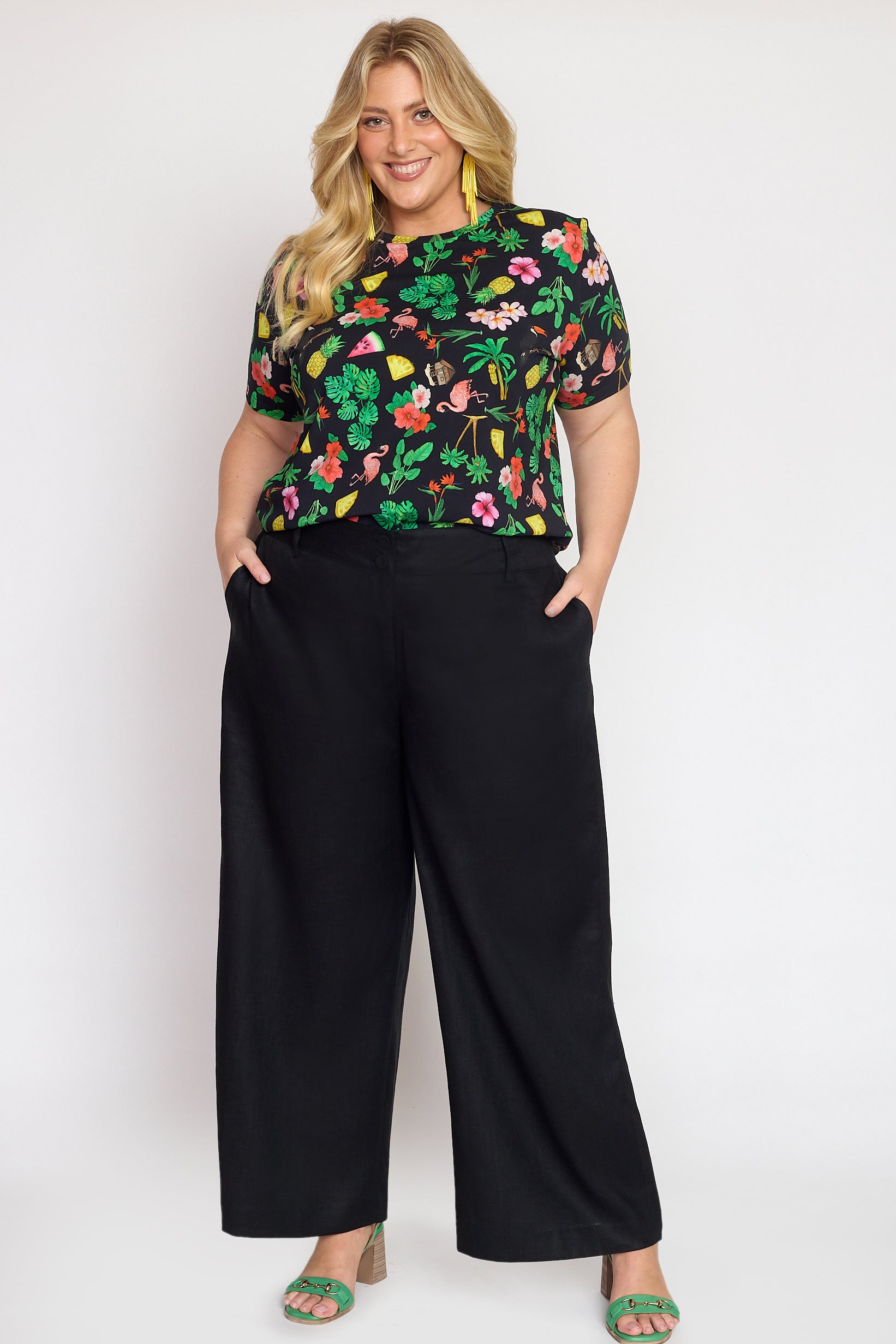 Model wearing Bianca Pant in black – high-rise waist and relaxed straight silhouette