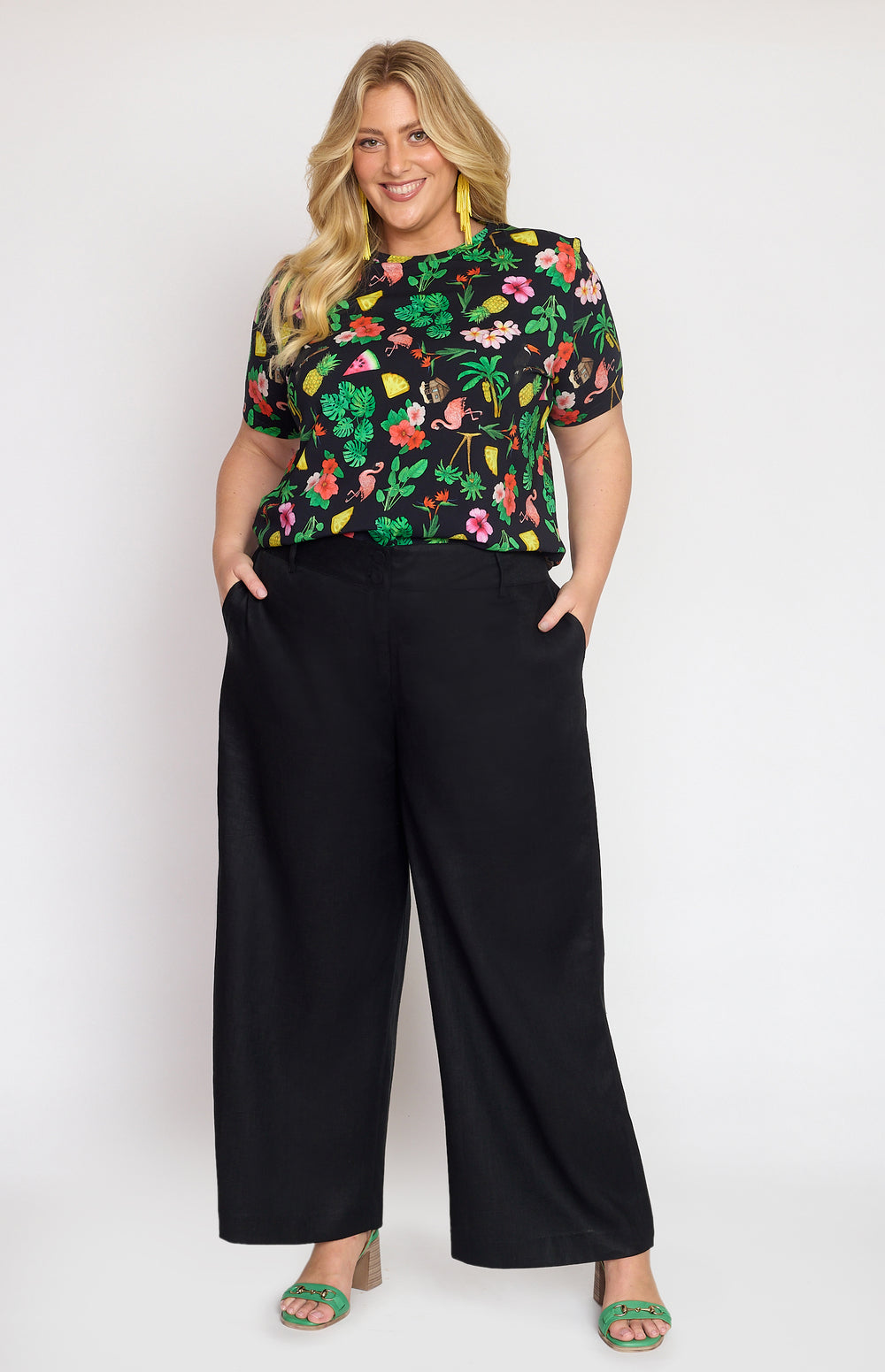 Model wearing Bianca Pant in black – high-rise waist and relaxed straight silhouette