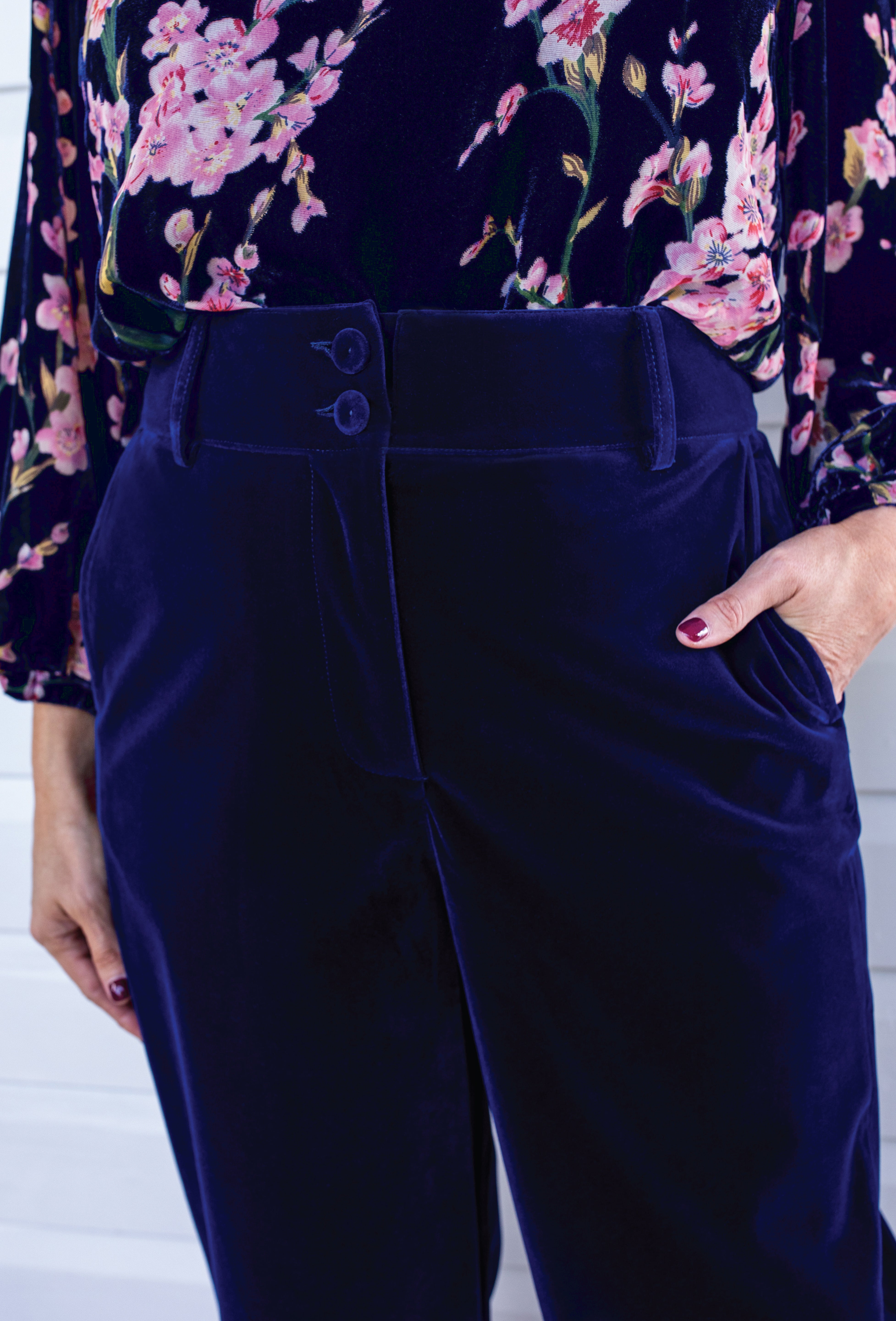 Close-up of plush midnight velvet fabric and high structured waistband detail on the Bianca Pant