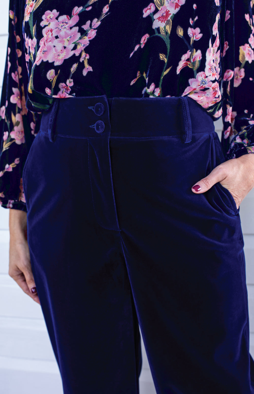 Close-up of plush midnight velvet fabric and high structured waistband detail on the Bianca Pant