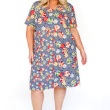 Blossom Dress in peach blossoms