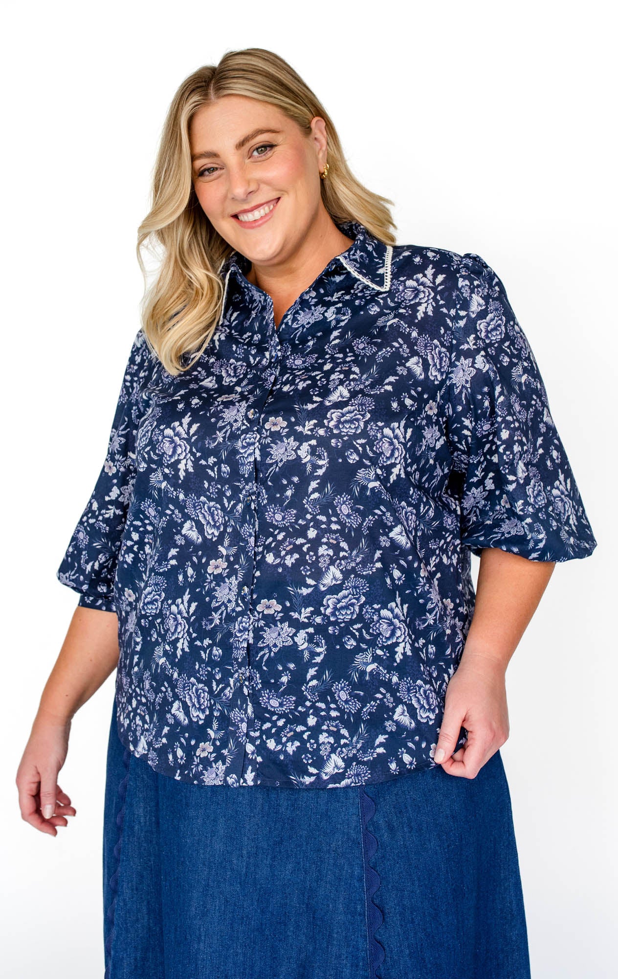  Maiocchi's Cherry Blouse in navy swoon, perfect for everyday or something more fancy, and features our exclusive print.