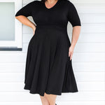 Maiocchi Cleo Dress in black – flattering hourglass silhouette with curved panels and full skirt