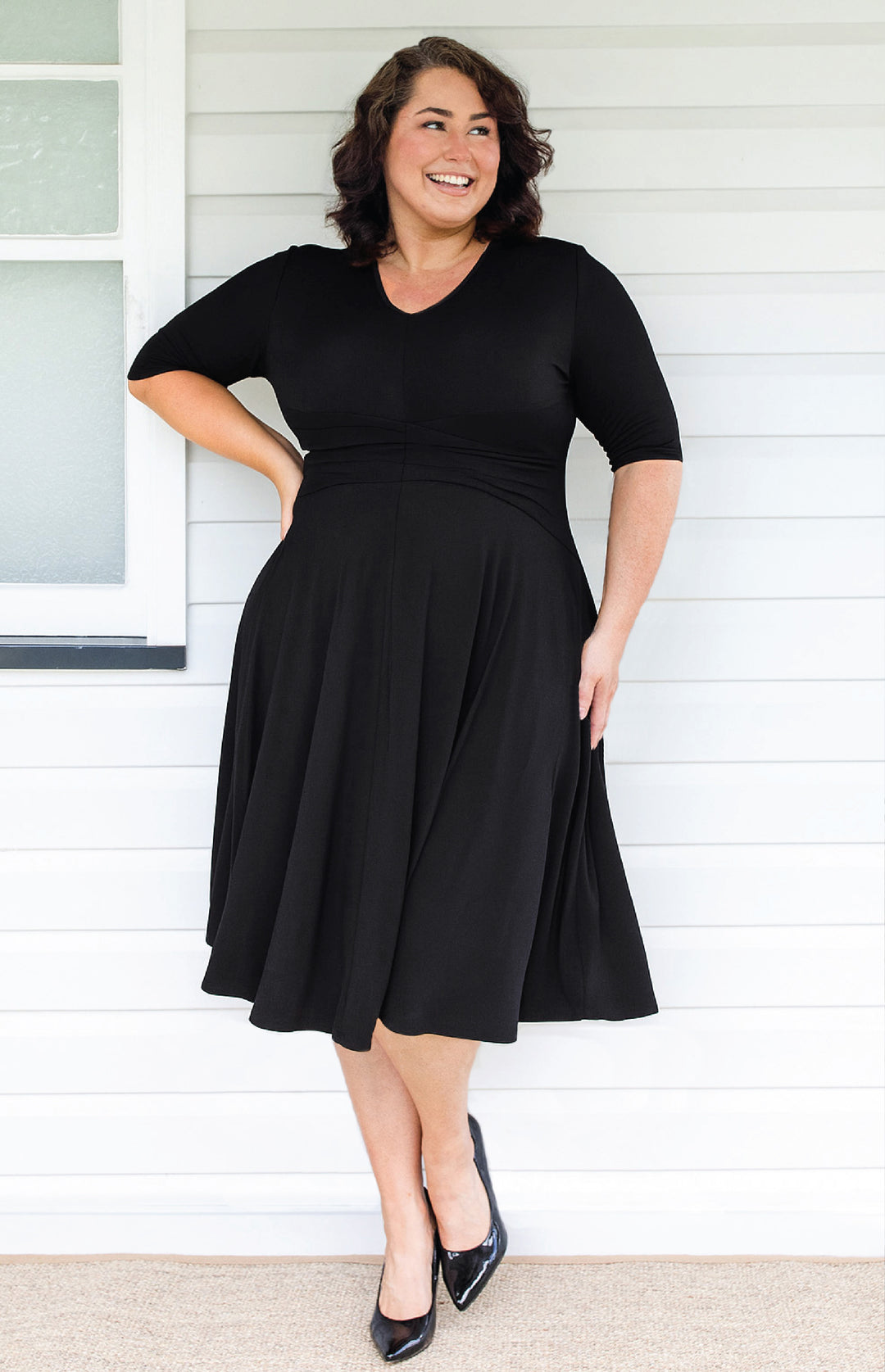 Maiocchi Cleo Dress in black – flattering hourglass silhouette with curved panels and full skirt