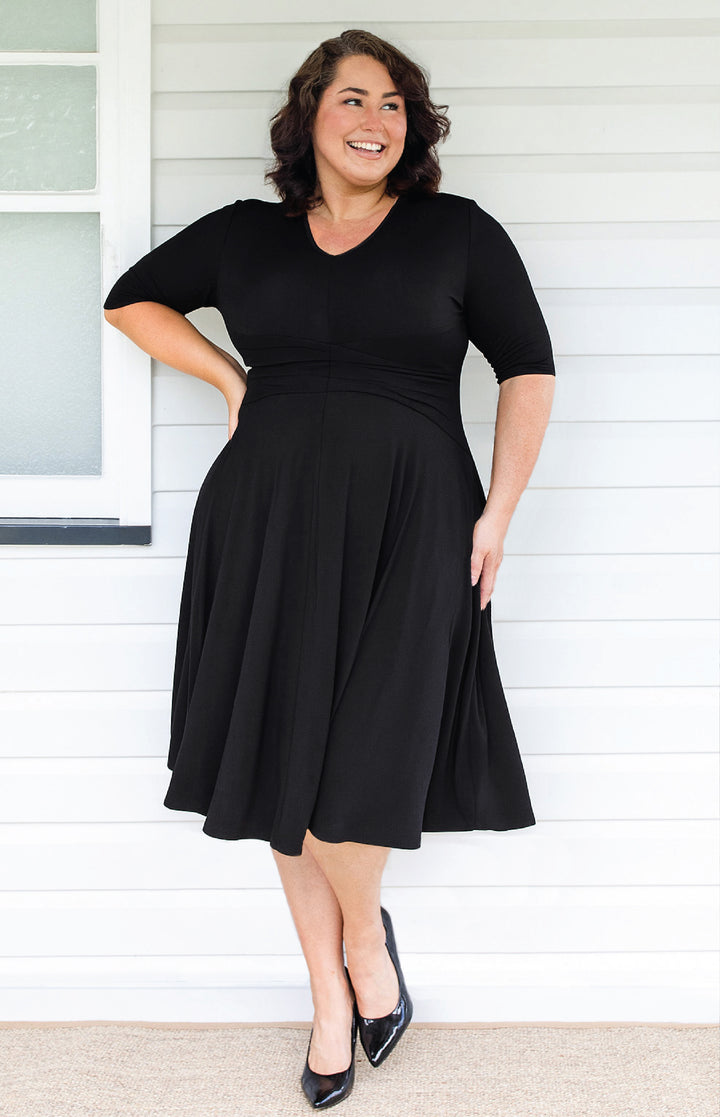 Maiocchi Cleo Dress in black – flattering hourglass silhouette with curved panels and full skirt