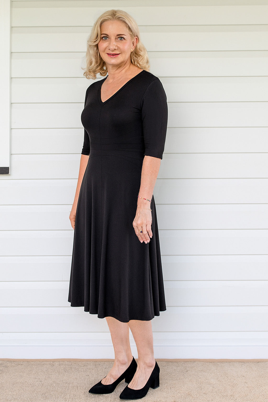 Cleo Dress in black – tuck-accented waist and twirly A-line skirt