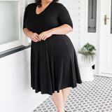 Maiocchi Cleo Dress in black – flattering hourglass silhouette with curved panels and full skirt