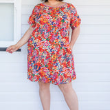 Crowd Pleaser Dress in name dropper red