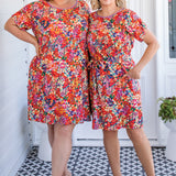 Crowd Pleaser Dress in name dropper red