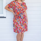Crowd Pleaser Dress in name dropper red