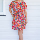 Crowd Pleaser Dress in name dropper red