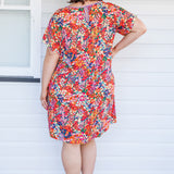 Crowd Pleaser Dress in name dropper red
