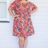 Crowd Pleaser Dress in name dropper red