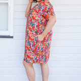Crowd Pleaser Dress in name dropper red