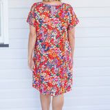 Crowd Pleaser Dress in name dropper red