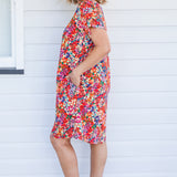 Crowd Pleaser Dress in name dropper red