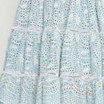 Close-up of embroidered cotton lace and ladder trim on Eloise Dress in blue lace