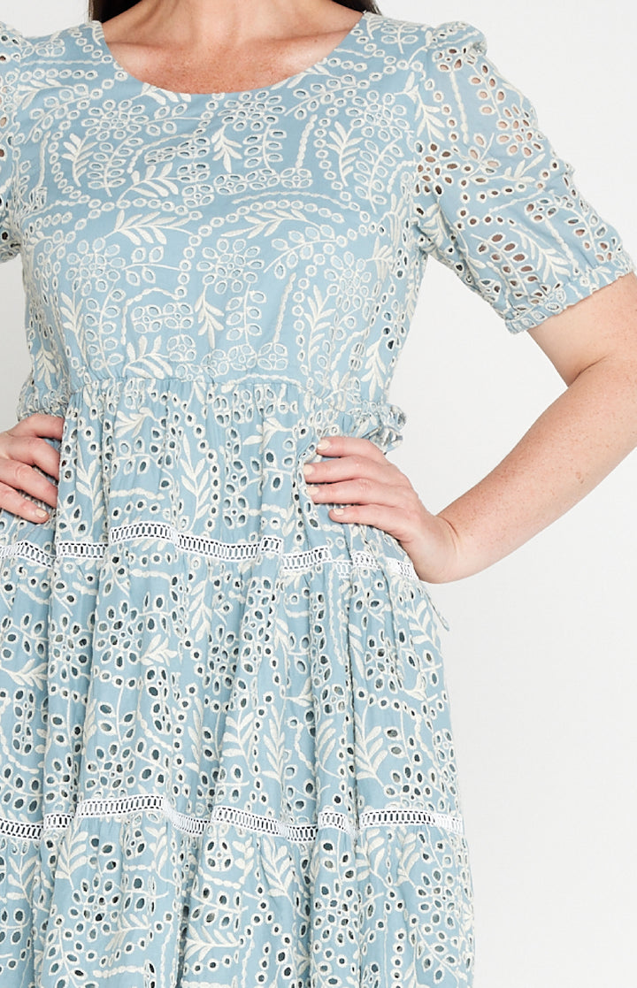 Round neckline and adjustable drawstring waist on Eloise Dress in blue lace