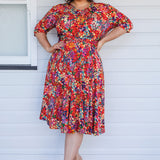 Emily Reversible Dress in name dropper red
