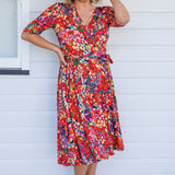 Emily Reversible Dress in name dropper red