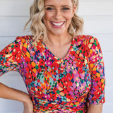Emily Reversible Dress in name dropper red