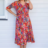 Emily Reversible Dress in name dropper red