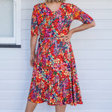 Emily Reversible Dress in name dropper red