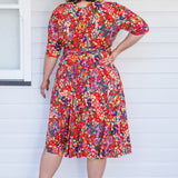 Emily Reversible Dress in name dropper red