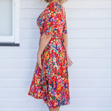 Emily Reversible Dress in name dropper red