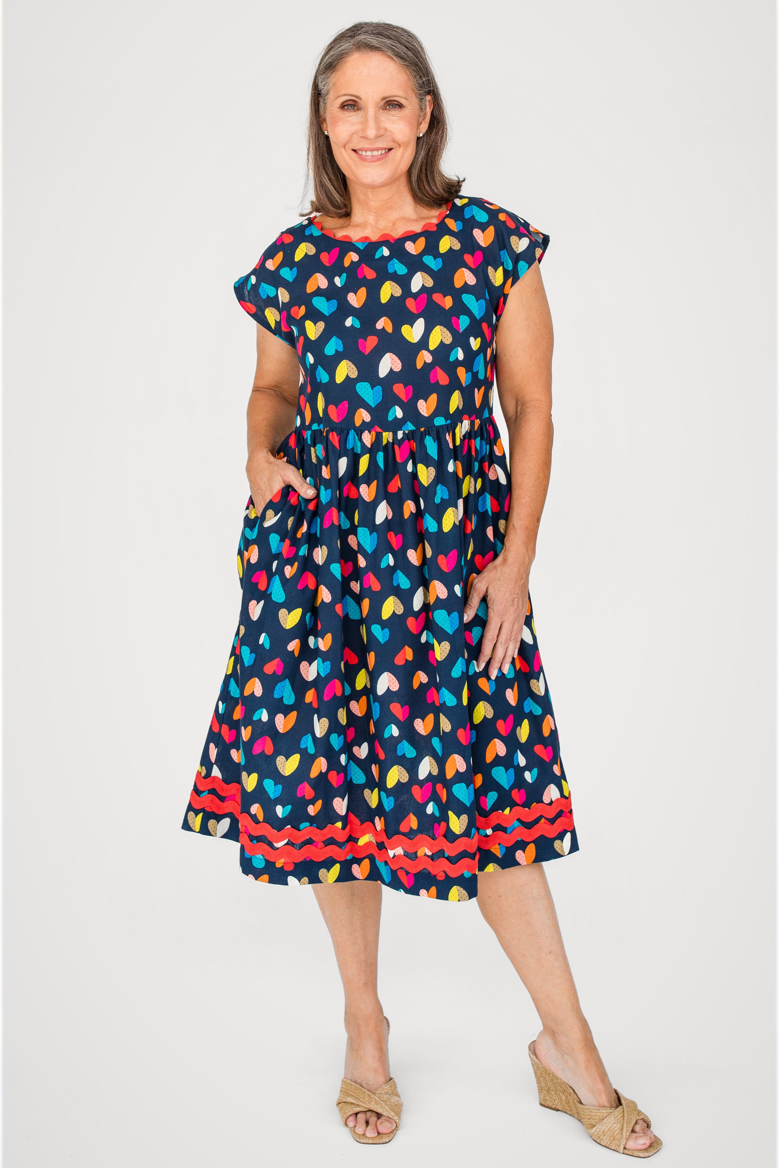 Holiday Dress in rainbow hearts