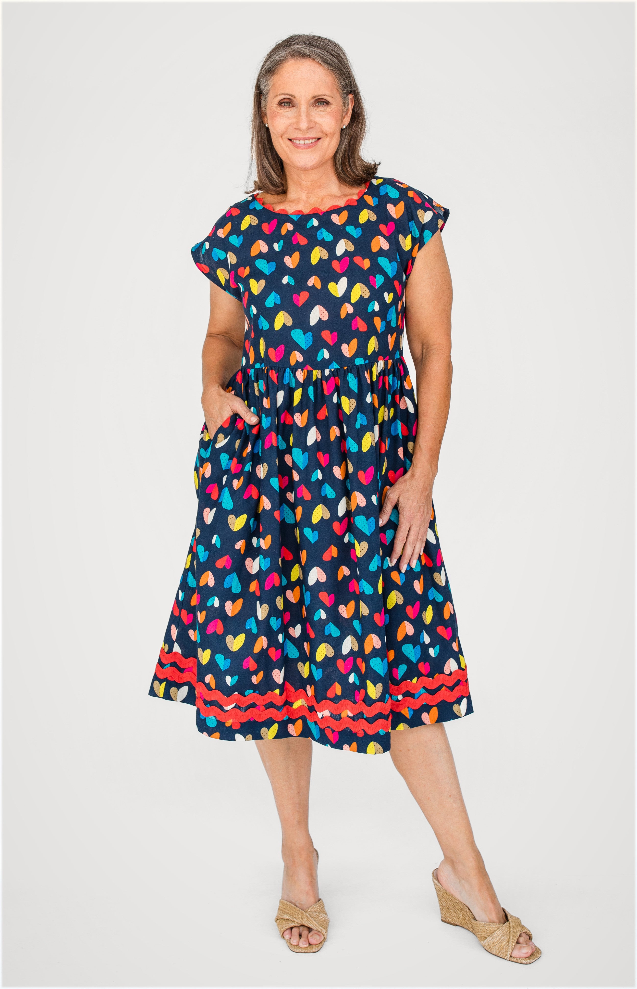 Holiday Dress in rainbow hearts