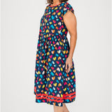 Holiday Dress in rainbow hearts