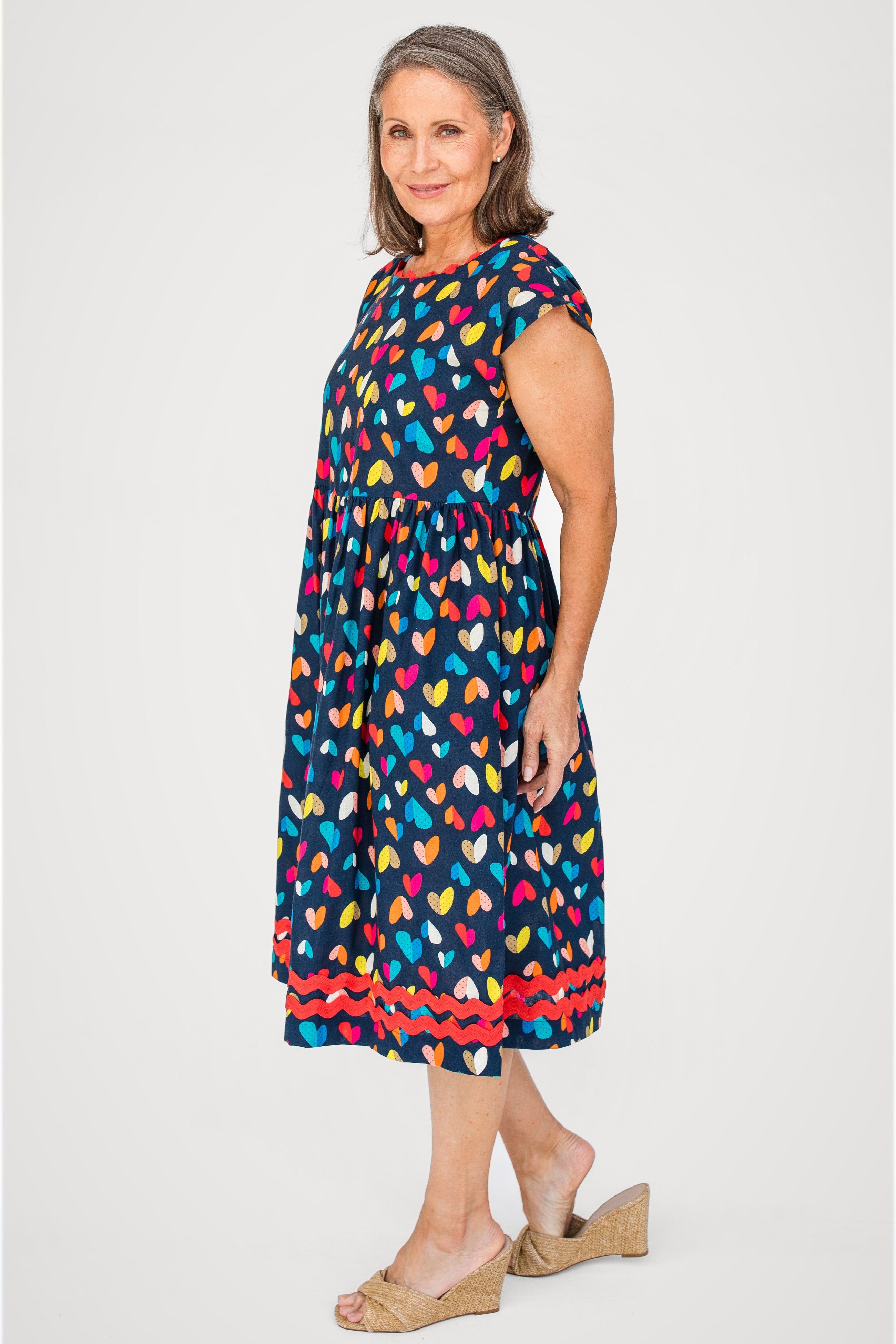 Holiday Dress in rainbow hearts