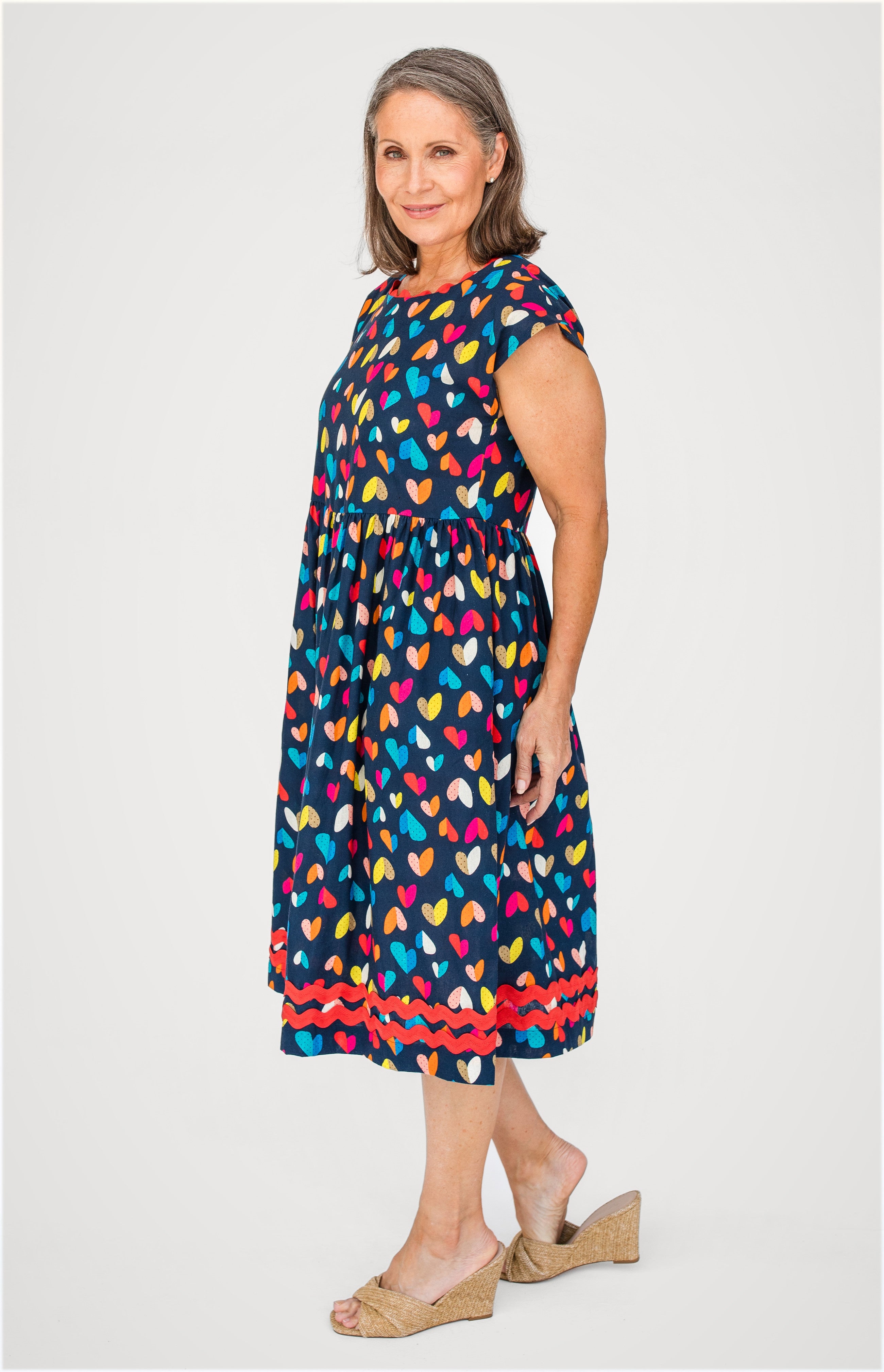 Holiday Dress in rainbow hearts