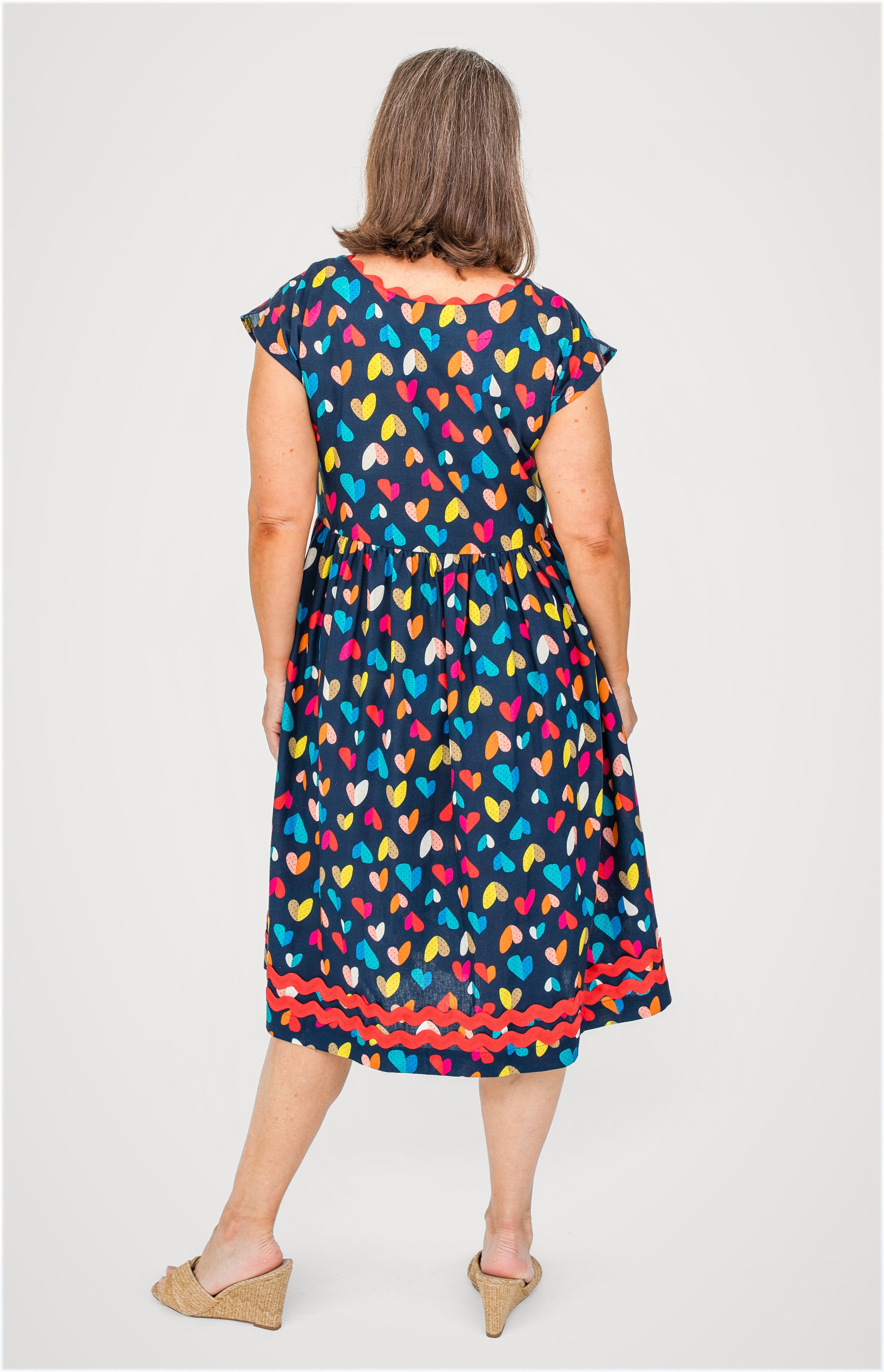 Holiday Dress in rainbow hearts