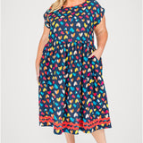 Holiday Dress in rainbow hearts